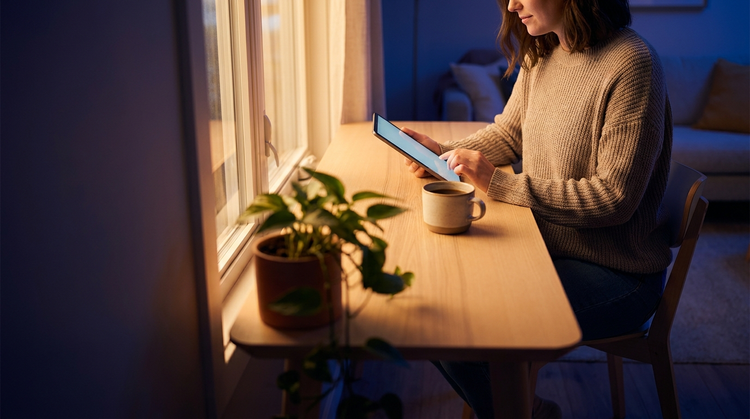 MindWell Guides hero — calm reader in warm light